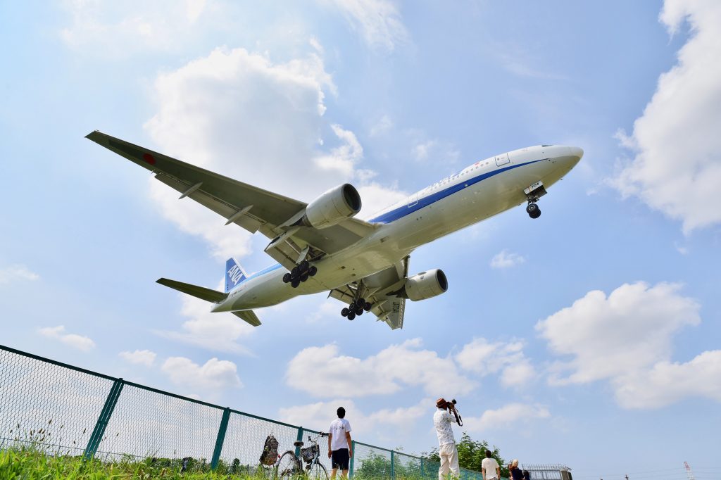 Aviation apps: plane flying over people
